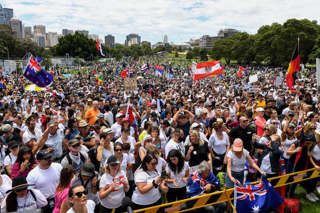 News Themen der Woche KW49 FACE THE MUSIC RALLY, Protesters hold placards during a ReclaimTheLine rally dubbed Face the Music, against against vaccine mandates and vaccine passports in Sydney, Sunday, December 12, 2021. ( NO ARCHIVING, EDITORIAL USE ONLY, NO USE IN BOOKS WITHOUT CONSENT SYDNEY NSW AUSTRALIA  Copyright: xBIANCAxDExMARCHIx 20211212001605787201