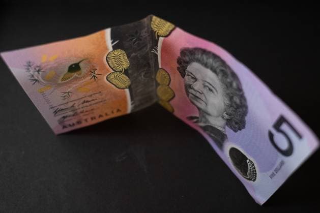 CURRENCY STOCK, The head of Queen Elizabeth II is seen on a five (5) Australian Dollar (A$) note in Canberra, Thursday, December 16, 2021. ( NO ARCHIVING, EDITORIAL USE ONLY, NO USE IN BOOKS WITHOUT CONSENT CANBERRA ACT AUSTRALIA  Copyright: xLUKASxCOCHx 20211216001607053764