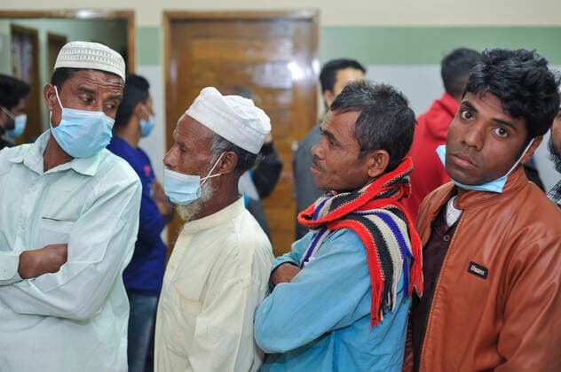 December 20, 2021: 20 December 2021 Sylhet, Bangladesh: Aged people queue to be able to receive a Pfizer 2nd dose against Covid-19 disease at the M A G Osmani medical college & hospital vaccination center in Sylhet. Meanwhile, in Dhaka city of Bangladesh launched the COVID-19 booster shot campaign from Sunday with Pfizer vaccine to scale up its efforts for containing the spread of the lethal virus. - ZUMAr143 20211220_zap_r143_009 Copyright: xMdxRafayatxHaquexKhanx