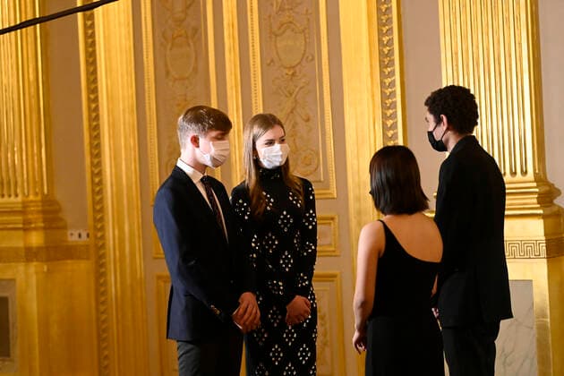 Prince Emmanuel and Crown Princess Elisabeth meet musicians at the rehearsal of the yearly Christmas concert, in the Throne Room (Salle du Trone - Troonzaal) at the Royal Palace in Brussels, Tuesday 21 December 2021.  POOLxPHILIPxREYNAERTS 3160753