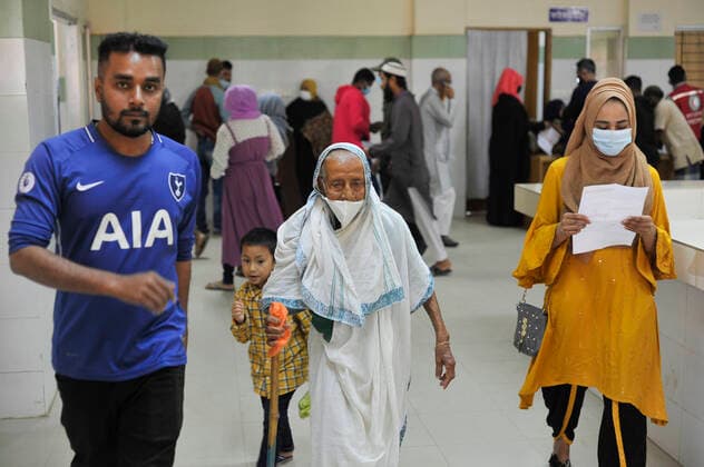 December 23, 2021: Sylhet, Bangladesh: An 80 years oldage women come to receive a Pfizer dose against Covid-19 disease at the M A G Osmani medical college & hospital vaccination center in Sylhet. Meanwhile, in Dhaka city of Bangladesh launched the COVID-19 booster shot campaign with Pfizer vaccine to scale up its efforts for containing the spread of the lethal virus. - ZUMAr143 20211223_zap_r143_010 Copyright: xMdxRafayatxHaquexKhanx