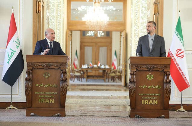 News Themen der Woche KW51 News Bilder des Tages December 23, 2021, Tehran, Tehran, Iran: Iranian Foreign Minister HOSSEIN AMIR-ABDOLLAHIAN (R) and his Iraqi counterpart FUAD HUSSEIN (L) hold a joint press conference following their meeting at the building in Tehran, Iran on December 23, 2021. Hussein is in Tehran to meet with Iranian officials. Tehran Iran - ZUMAi98_ 20211223_zih_i98_041 Copyright: xIranianxForeignxMinistryx