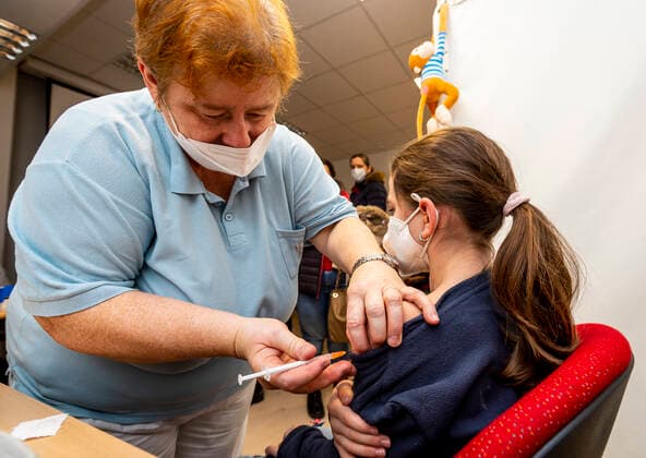 A child receives the anti-COVID vaccine for children aged 5-11 in the Masaryk Hospital in Usti nad Labem, Czech Republic, December 27, 2021. (CTKxPhoto OndrejxHajek) CTKPhotoP2021122702020  HAJ 12