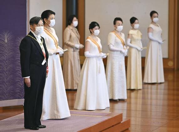 New Year ceremony by Japan s imperial family Japanese Emperor Naruhito (L) and Empress Masako (2nd from L) attend a scaled-down New Year s ceremony at the Imperial Palace in Tokyo on Jan. 1, 2022, wearing masks for protection against the coronavirus. (Pool photo)  A14AA0001175252P