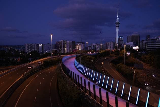 (220101) -- AUCKLAND, Jan. 1, 2022 -- Vehicles run on a highway in Auckland, New Zealand, Dec. 31, 2021. Local authorities canceled the New Year fireworks amid the COVID-19 spread. (Photo by Xinhua) NEW ZEALAND-AUCKLAND-NEW YEAR ZhaoxGang 