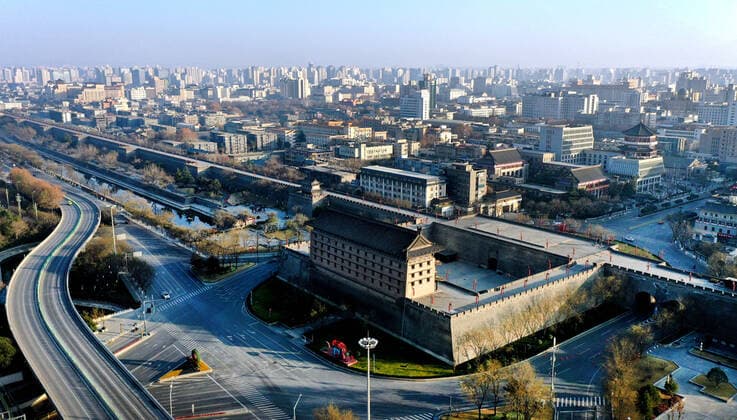 (220101) -- XI AN, Jan. 1, 2022 -- Aerial photo taken on Jan. 1, 2022 shows the city view of Xi an, northwest China s Shaanxi Province. Xi an, a northwestern Chinese city hit by a recent COVID-19 resurgence, has been making all-out efforts to ensure sufficient food and medicine supplies for its 13 million people who have been under lockdown for over a week. ) CHINA-SHAANXI-XI AN-COVID-19-RESURGENCE (CN) TaoxMing 