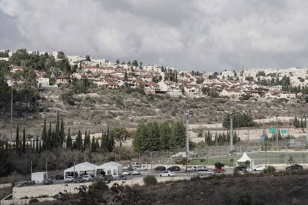 January 3, 2022, Jerusalem, Israel: Drivers queue for COVID-19 PCR tests at the Emek Arazim Sportek in Jerusalem as Israel faces a surge in Coronavirus infection most likely due to the Omicron variant. PM Bennett said that up to 50,000 people might soon be infected daily. Israel has authorized a fourth booster vaccine for the elderly over 60 and others vulnerable to severe disease and has approved Merck & Co s Molnupiravir antiviral pill for patients over 18. Jerusalem Israel - ZUMAa126 20220103_zap_a126_002 Copyright: xNirxAlonx