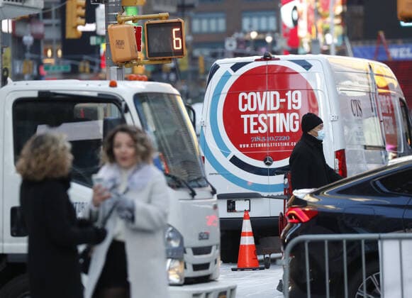 A COVID-19 mobil testing site is parked Times Square in New York City on Tuesday, January 4, 2022. The United States continues to set records for positive COVID cases.  NYP20220104109 JohnxAngelillo