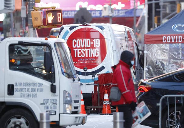 A COVID-19 mobil testing site is parked Times Square in New York City on Tuesday, January 4, 2022. The United States continues to set records for positive COVID cases.  NYP20220104111 JohnxAngelillo