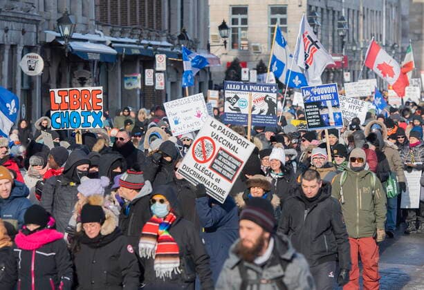 January 8, 2022, Montreal, PQ, Canada: People take part in a demonstration against the Quebec governmentöÄÃ s measures to curb the spread of COVID-19 in Montreal, Saturday, Jan. 8, 2022. Montreal Canada  - ZUMAc35_ 20220108_zaf_c35_041 Copyright: xGrahamxHughesx