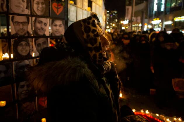 January 8, 2022, TORONTO, ON, Canada: A woman mourns at a vigil in Toronto on Saturday, January 8, 2022 in memory of the 176 victims of Ukraine International Airlines Flight PS752 that was shot down by Iranian forces two years ago. TORONTO Canada  - ZUMAc35_ 20220108_zaf_c35_136 Copyright: xChrisxYoungx