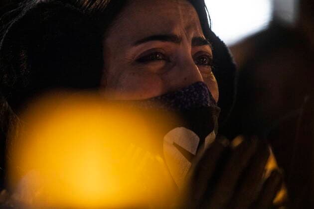 January 8, 2022, TORONTO, ON, Canada: A woman mourns at a vigil in Toronto on Saturday, January 8, 2022 in memory of the 176 victims of Ukraine International Airlines Flight PS752 that was shot down by Iranian forces two years ago. TORONTO Canada  - ZUMAc35_ 20220108_zaf_c35_138 Copyright: xChrisxYoungx