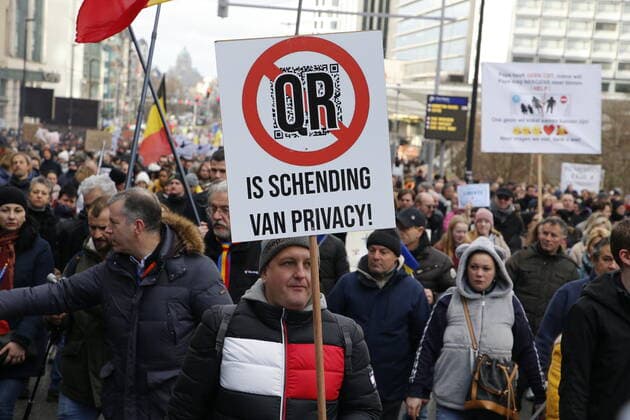 People gather for a protest against corona measures under the together for freedom moniker, Sunday 09 January 2022 in Brussels.  NICOLASxMAETERLINCK 3169641