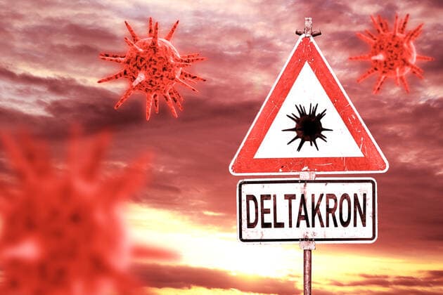 Deltakron neue Covid-19 Coronavirus Mutante Mutation des Sars Cov 2 Virus eine Mischung aus der Delta und Omikron Variante, Warnschild Symbol Delta Kron xFOTOMONTAGEx