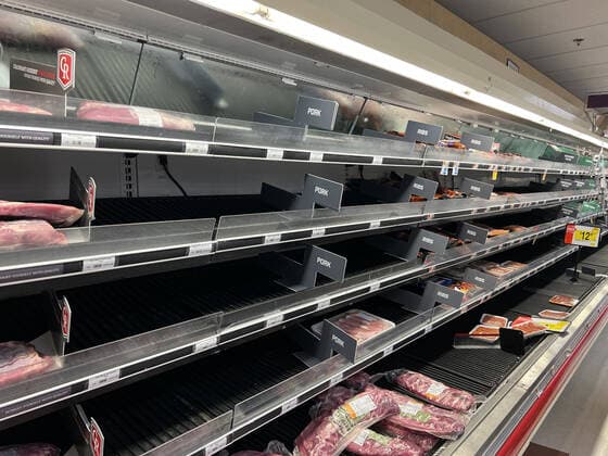 ALEXANDRIA, VA - JANUARY 9: View of empty shelves at a local Giant supermarket as the omicron covid variant causes widespread supply chain delays resulting in empty shelves in many food markets on January 9, 2022 in Alexandria, Virginia. Copyright: xmpi34x