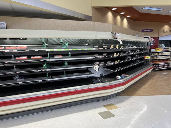 ALEXANDRIA, VA - JANUARY 9: View of empty shelves at a local Giant supermarket as the omicron covid variant causes widespread supply chain delays resulting in empty shelves in many food markets on January 9, 2022 in Alexandria, Virginia. Copyright: xmpi34x