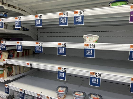 ALEXANDRIA, VA - JANUARY 9: View of empty shelves at a local Giant supermarket as the omicron covid variant causes widespread supply chain delays resulting in empty shelves in many food markets on January 9, 2022 in Alexandria, Virginia. Copyright: xmpi34x