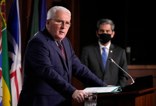 January 10, 2022, Ottawa, ON, Canada: Conservative MP John Brassard responds to a question as MP Pierre Paul-Hus responds to a question during a news conference on the collection of mobile data by the Public Health Agency of Canada, Monday, January 10, 2022 in Ottawa. Ottawa Canada  - ZUMAc35_ 20220110_zaf_c35_010 Copyright: xAdrianxWyldx