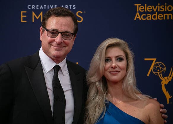 January 10, 2022, Los Angeles, California, USA: Actor Comdian, Bob Saget dies at the age of 65 in his room at the Ritz-Carlton in Orlando, Florida. FILE PHOTO: Bob Saget with wife Kelly Rizzo on the red carpet of the 2018 Creative Arts Awards held at the Microsoft Theater on Saturday September 8, 2018 in Los Angeles, California. PI Los Angeles USA - ZUMAp124 20220110_zaa_p124_005 Copyright: xARIANAxRUIZx
