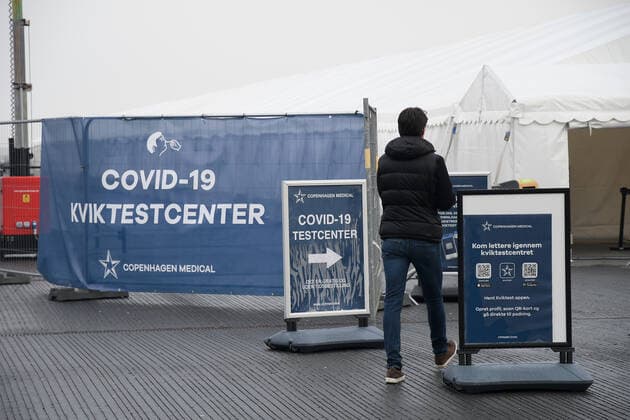 Copenhagen Denmark. 12 January 2021 People walk to Covid-19 quick test center in danish capital Copenhagen Denmark (Photo..Francis Joseph Dean Dean Pictures)