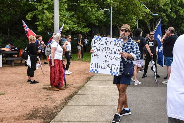 VOICES 4 THE KIDS RALLY, Protesters hold signs during a Voices 4 the Kids protest against vaccination policies at Prince Alfred Park in Sydney, Saturday, January 15, 2022. ( NO ARCHIVING, EDITORIAL USE ONLY, NO USE IN BOOKS WITHOUT CONSENT SYDNEY NSW AUSTRALIA  Copyright: xFLAVIOxBRANCALEONEx 20220115001613508537