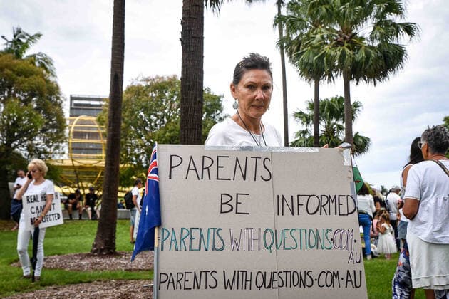 VOICES 4 THE KIDS RALLY, Protesters hold signs during a Voices 4 the Kids protest against vaccination policies at Prince Alfred Park in Sydney, Saturday, January 15, 2022. ( NO ARCHIVING, EDITORIAL USE ONLY, NO USE IN BOOKS WITHOUT CONSENT SYDNEY NSW AUSTRALIA  Copyright: xFLAVIOxBRANCALEONEx 20220115001613508592