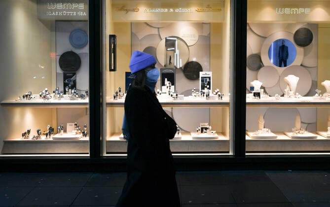 (220115) -- FRANKFURT, Jan. 15, 2022 -- A pedestrian walks past shopwindows of a shopping mall in Frankfurt, Germany, Jan. 15, 2022. Germany s gross domestic product (GDP) rose by 2.7 percent in 2021 compared with the previous year but was down 2.0 percent from the pre-COVID-19 crisis year 2019, the Federal Statistical Office (Destatis) said on Friday. ) GERMANY-FRANKFURT-GDP LuxYang 