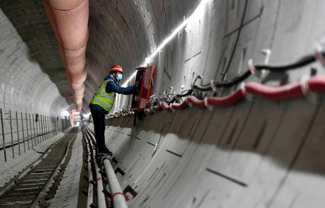 (220118) -- TIANJIN, Jan. 18, 2022 -- A staff member maintains electrical facilities at the construction site of Tianjin Subway Line 11 in north China s Tianjin, Jan. 17, 2022. Tianjin has taken efforts to ensure the project development of Subway Line 11 on time with strict epidemic prevention measures following a recent COVID-19 resurgence. ) CHINA-TIANJIN-COVID-19-CONSTRUCTION (CN) ZhaoxZishuo 