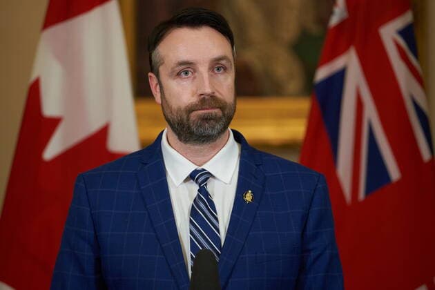 January 18, 2022, Winnipeg, MB, CANADA: Andrew Smith, Minister of Sport, Culture and Heritage, Minister Responsible for Manitoba Centennial Centre Corporation and Minister Responsible for Travel Manitoba, speaks to the media at a press conference after he is sworn-in at the Manitoba Legislative Building in Winnipeg, Manitoba, Tuesday January 18, 2022. Winnipeg CANADA - ZUMAc35_ 20220118_zaf_c35_080 Copyright: xDavidxLipnowskix