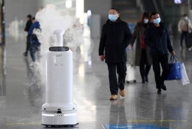 (211219) -- HEFEI, Dec. 19, 2021 -- Air environment automatic sterilizer robot Xiao Chuang sprays disinfectant at Hefei South Railway Station in Hefei, east China s Anhui Province, Jan. 18, 2022. Air environment automatic sterilizer robot Xiao Chuang, intelligent temperature measuring robot Da Bai and ground cleaning and disinfecting robot Xiao De have been in service for COVID-19 prevention and control during the annual Spring Festival travel rush in Hefei. ) CHINA-ANHUI-RAILWAY STATION-ROBOTS (CN) ZhouxMu 