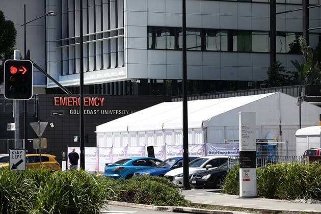 QLD COVID19 HOSPITALS TENTS, COVID-19 treatment tents are seen at The Gold Coast University hospital, Southport Friday, January 21, 2022. Tents are going up at hospitals in Queensland to keep up with the strain on the health system. ( NO ARCHIVING, EDITORIAL USE ONLY, NO USE IN BOOKS WITHOUT CONSENT BRISBANE QLD AUSTRALIA  Copyright: xJONOxSEARLEx 20220121001615358620