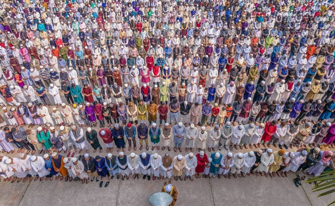 January 22, 2022, Barishal, Barishal, Bangladesh: Aerial view shows People attending a Muslim Funeral of a person who lost the battle against new Covid-19 OMICRON Variant in Barishal, Bnagladesh. Barishal Bangladesh - ZUMAr337 20220122_zip_r337_007 Copyright: xMustasinurxRahmanxAlvix