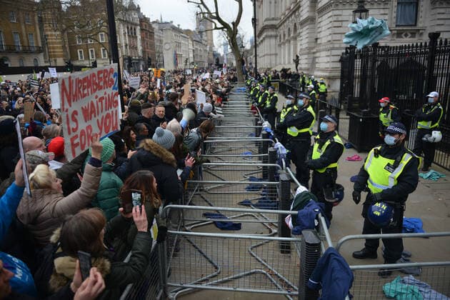 . 22 01 2022. London, United Kingdom. Protesters throw NHS clothing during a freedom rally outside Downing Street in London.  xHowardxJonesx xi-Imagesx IIM-23033-0007