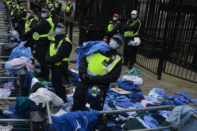 . 22 01 2022. London, United Kingdom. Protesters throw NHS clothing during a freedom rally outside Downing Street in London.  xHowardxJonesx xi-Imagesx IIM-23033-0016