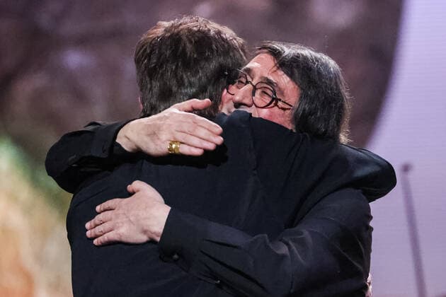 MOSCOW, RUSSIA â€“ JANUARY 24, 2022: Conductor Yuri Bashmet (R) and Finnish pianist Olli Mustonen hug during a concert marking Bashmet s 69th birthday at the Tchaikovsky Concert Hall; the concert is held as part of the 2022 Winter International Arts Festival. Artyom Geodakyan TASS  TS120246