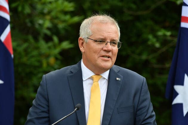 2022 AUSTRALIAN OF THE YEAR AWARDS MORNING TEA, Prime Minister Scott Morrison speaks during a morning tea for state and territory recipients in the 2022 Australian of the Year Awards at The Lodge in Canberra, Tuesday, January 25, 2022. ( NO ARCHIVING, EDITORIAL USE ONLY, NO USE IN BOOKS WITHOUT CONSENT CANBERRA ACT AUSTRALIA  Copyright: xMICKxTSIKASx 20220125001616760697