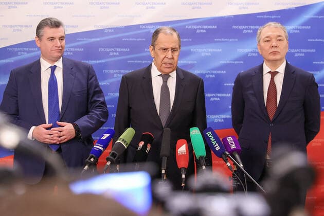 MOSCOW, RUSSIA - JANUARY 26, 2022: Russia s Foreign Minister Sergei Lavrov (C), International Affairs Committee Chairman Leonid Slutsky (L), and CIS Committee Chairman Leonid Kalashnikov (R) during a press conference following a plenary meeting of the Russian State Duma. Russian Foreign Ministry TASS  TS120462