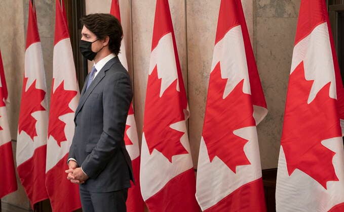 January 26, 2022, Ottawa, ON, Canada: Canadian Prime Minister Justin Trudeau listens to a minister respond to a question during a media availability following a cabinet retreat, Wednesday, Jan. 26, 2022 in Ottawa. Trudeau says Canada is extending its mission to train Ukrainian soldiers by three years. Ottawa Canada  - ZUMAc35_ 20220126_zaf_c35_020 Copyright: xAdrianxWyldx