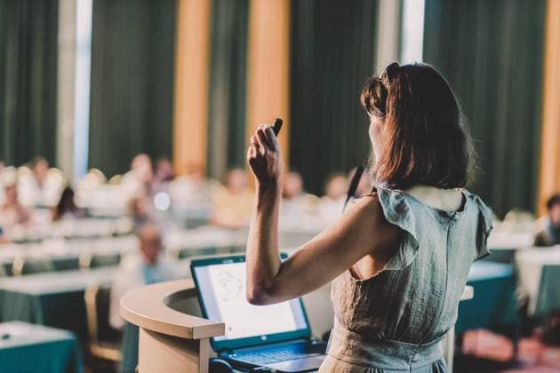 Speaker at Business Conference and Presentation. Female speaker at Business Conference and Presentation. Audience at the conference hall. Business and Entrepreneurship. Business woman. Horizontal composition. Copyright: xMatejxKastelicx 35039538