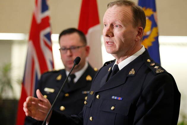 January 27, 2022, WINNIPEG, MANITOBA, CANADA: Manitoba RCMP Superintendent Rob Lasson, major crime services, provides investigation details as Chief Superintendent Rob Hill, Criminal Operations Officer, listens in at a press conference where they provided an update and an identification of the four India citizens who died while crossing the Canada-U.S. border at D Division Headquarters in Winnipeg Thursday, January 27, 2022. Mounties are pleading for information surrounding the deaths of four Indian nationals whose bodies were found frozen in Manitoba near the Canada-U. S. border last week. WINNIPEG CANADA - ZUMAc35_ 20220127_zaf_c35_050 Copyright: xJohnxWoodsx