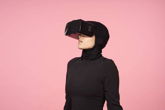 woman in black hijab glasses virtual reality technology movie watching woman in black hijab glasses virtual reality technology movie watching. High quality photo Copyright: xx 42120148