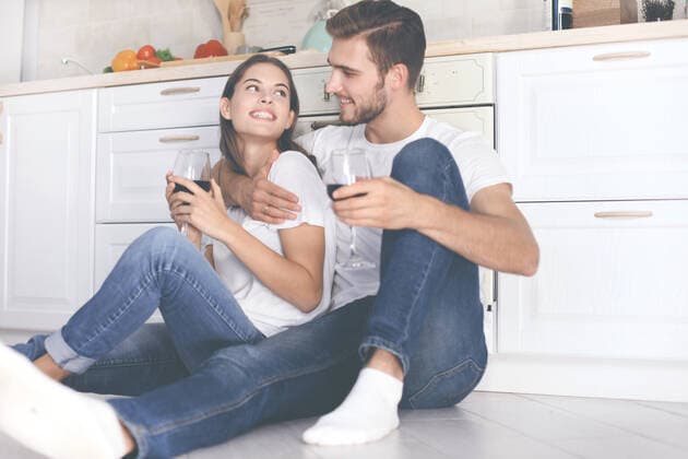 happy young couple sitting on floor in kitchen at home. happy young couple sitting on floor in kitchen at home. Copyright: xx 42759076