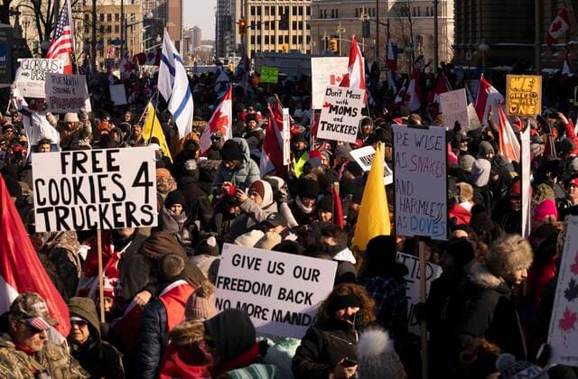 January 29, 2022, Ottawa, ON, Canada: Protesters participating in a cross-country truck convoy protesting measures taken by authorities to curb the spread of COVID-19 and vaccine mandates gather near Parliament Hill in Ottawa on Saturday, Jan. 29, 2022. Ottawa Canada  - ZUMAc35_ 20220129_zaf_c35_057 Copyright: xAdrianxWyldx