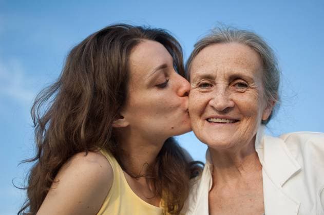 Senior mother with gray hair with her adult daughter looking at the camera in the garden and hugging each other during sunny day outdoors, mothers day Senior mother with gray hair with her adult daughter looking at the camera in the garden and hugging each other during sunny day outdoors, mothers day concept Copyright: xx 44032818