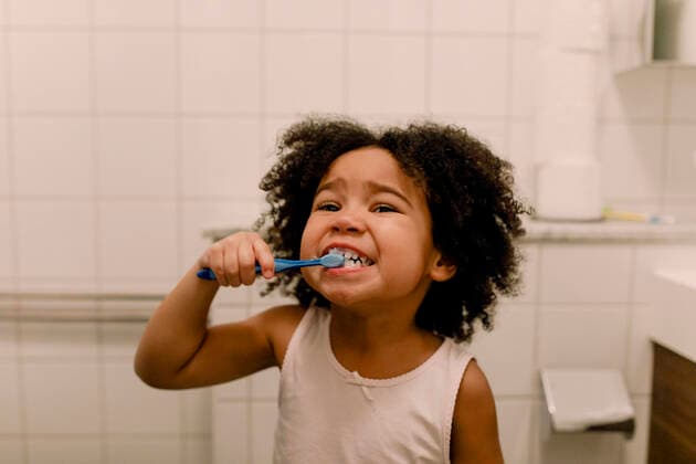 Girl brushing teeth in bathroom Sweden, Stockholm, model released, property released Copyright: xMaskotx , MA91921