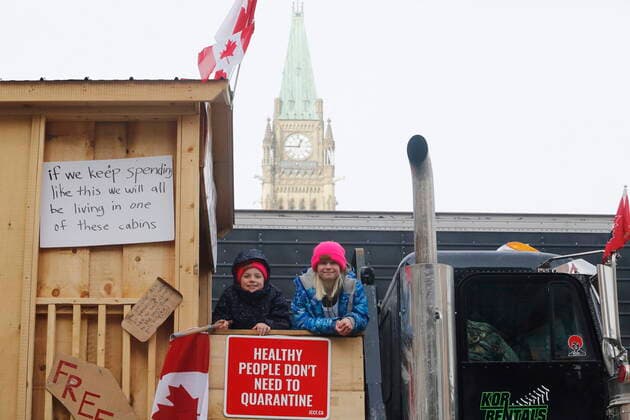 February 1, 2022, Ottawa, ON, CANADA: Children stand on top of a truck in front of Parliament Hill as a rally against COVID-19 restrictions, which began as a cross-country convoy protesting a federal vaccine mandate for truckers, continues in Ottawa, on Tuesday, February 1, 2022. As organizers behind the demonstration that has seized the nation s capital say they are preparing to stick around even longer by distributing fuel and supplies to the trucks clogging up Ottawa streets, politicians at all levels of government are asking them to roll out. Ottawa CANADA  - ZUMAc35_ 20220201_zaf_c35_077 Copyright: xPatrickxDoylex