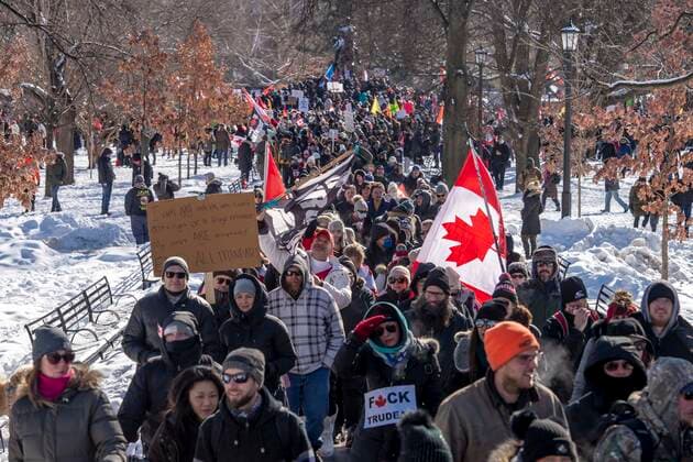February 5, 2022, Toronto, Ontario, Canada: Protesters gather on the streets on Toronto in opposition of COVID-19 measures and vaccine mandates imposed by the Justin Trudeau government. Organized by the Ã¢â‚¬oeFreedom ConvoyÃ¢â‚¬Â, the demonstration began with a cross-country trek opposing the federal governmentÃ¢â‚¬â ¢s vaccine mandate for cross-border truckers. Toronto Canada - ZUMAc232 20220205_zip_c232_005 Copyright: xGilesxCampbellx