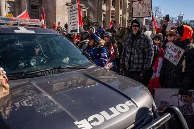 February 5, 2022, Toronto, Ontario, Canada: Protesters gather on the streets on Toronto in opposition of COVID-19 measures and vaccine mandates imposed by the Justin Trudeau government. Organized by the Ã¢â‚¬oeFreedom ConvoyÃ¢â‚¬Â, the demonstration began with a cross-country trek opposing the federal governmentÃ¢â‚¬â ¢s vaccine mandate for cross-border truckers. Toronto Canada - ZUMAc232 20220205_zip_c232_006 Copyright: xGilesxCampbellx