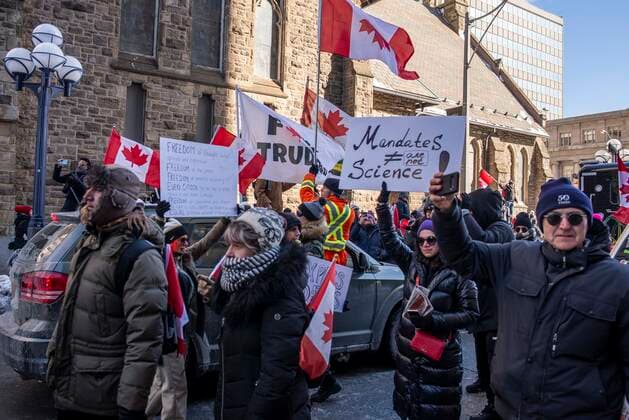 February 5, 2022, Toronto, Ontario, Canada: Protesters gather on the streets on Toronto in opposition of COVID-19 measures and vaccine mandates imposed by the Justin Trudeau government. Organized by the Ã¢â‚¬oeFreedom ConvoyÃ¢â‚¬Â, the demonstration began with a cross-country trek opposing the federal governmentÃ¢â‚¬â ¢s vaccine mandate for cross-border truckers. Toronto Canada - ZUMAc232 20220205_zip_c232_010 Copyright: xGilesxCampbellx