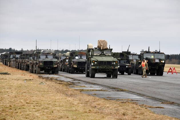 Various tactical vehicles assigned to the 2nd Squadron, 2nd Cavalry Regiment await to be loaded onto trucks at the 7th Army Training Command s Rose Barracks Air Field, Vilseck, Germany, on February 9, 2022. The Squadron will deploy to Romania in the coming days to augment the more than 900 U.S. service members already in Romania. This move is designed to respond to the current security environment and to reinforce the deterrent and defensive posture on NATO s eastern flank.  WAX2022020906 GertrudxZach